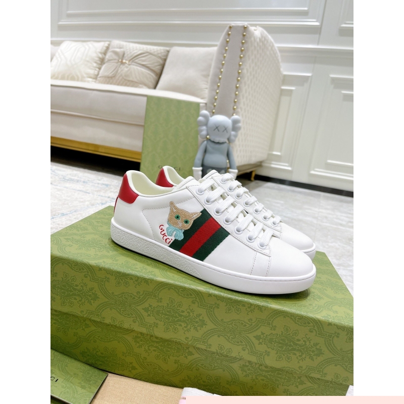 G*u*i sneakers